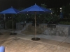 nighttime-restaurant-patio-with-umbrellas