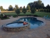 In-ground Pool with Attached Hot Tub