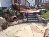 Outdoor Stone Patio with Steps and Wood Deck