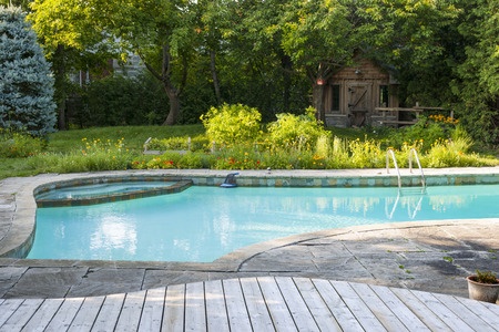 a concrete swimming pool design