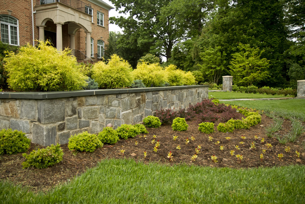 Outside of professionally landscaped home with great curb appeal