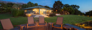 Luxury backyard fire pit at sunset