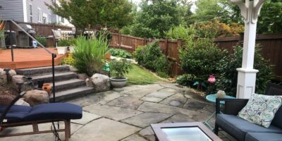 shaded area of backyard with covered pergola